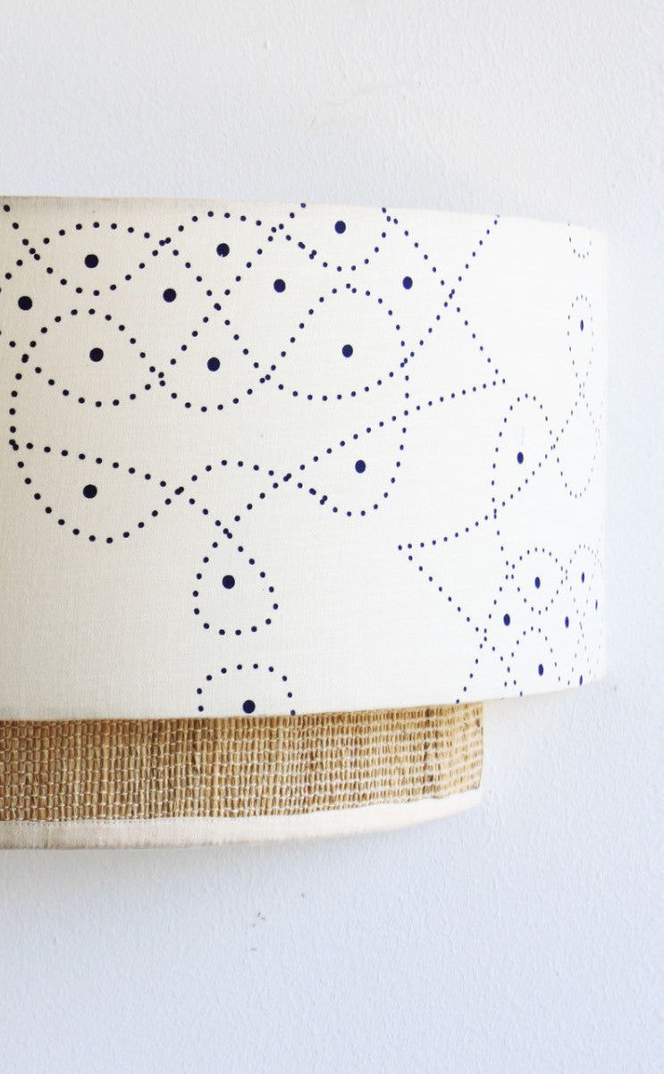 kolam constellation wall lamp / lighting. Entirely handmade in Bangalore India crafted from handprinted cottonsilk and banana fibre.