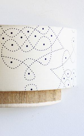 kolam constellation wall lamp / lighting. Entirely handmade in Bangalore India crafted from handprinted cottonsilk and banana fibre. 